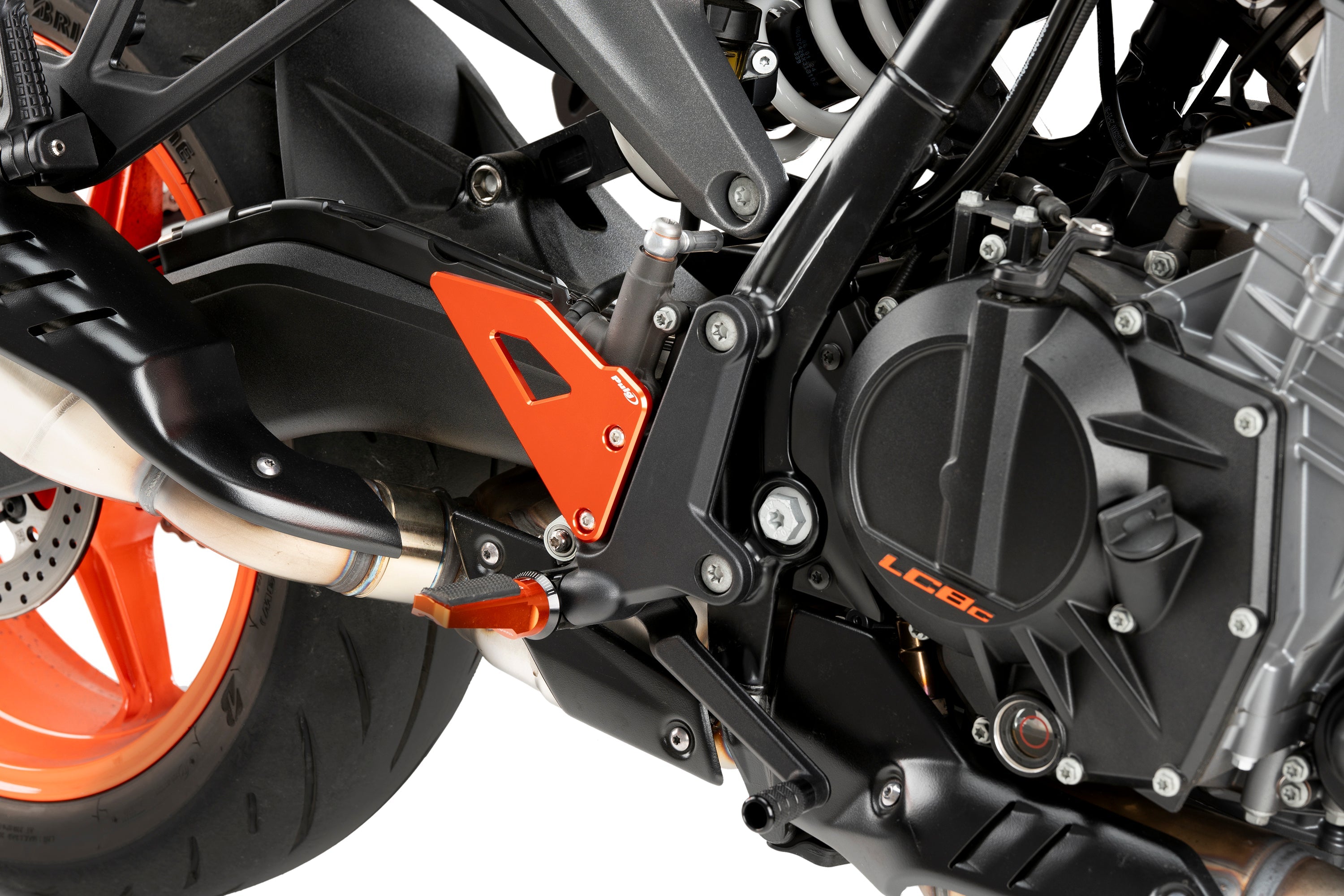 Puig Aluminium Heel Plates | Orange | KTM 990 Duke/R 2024>Currentย -ย Shop name
