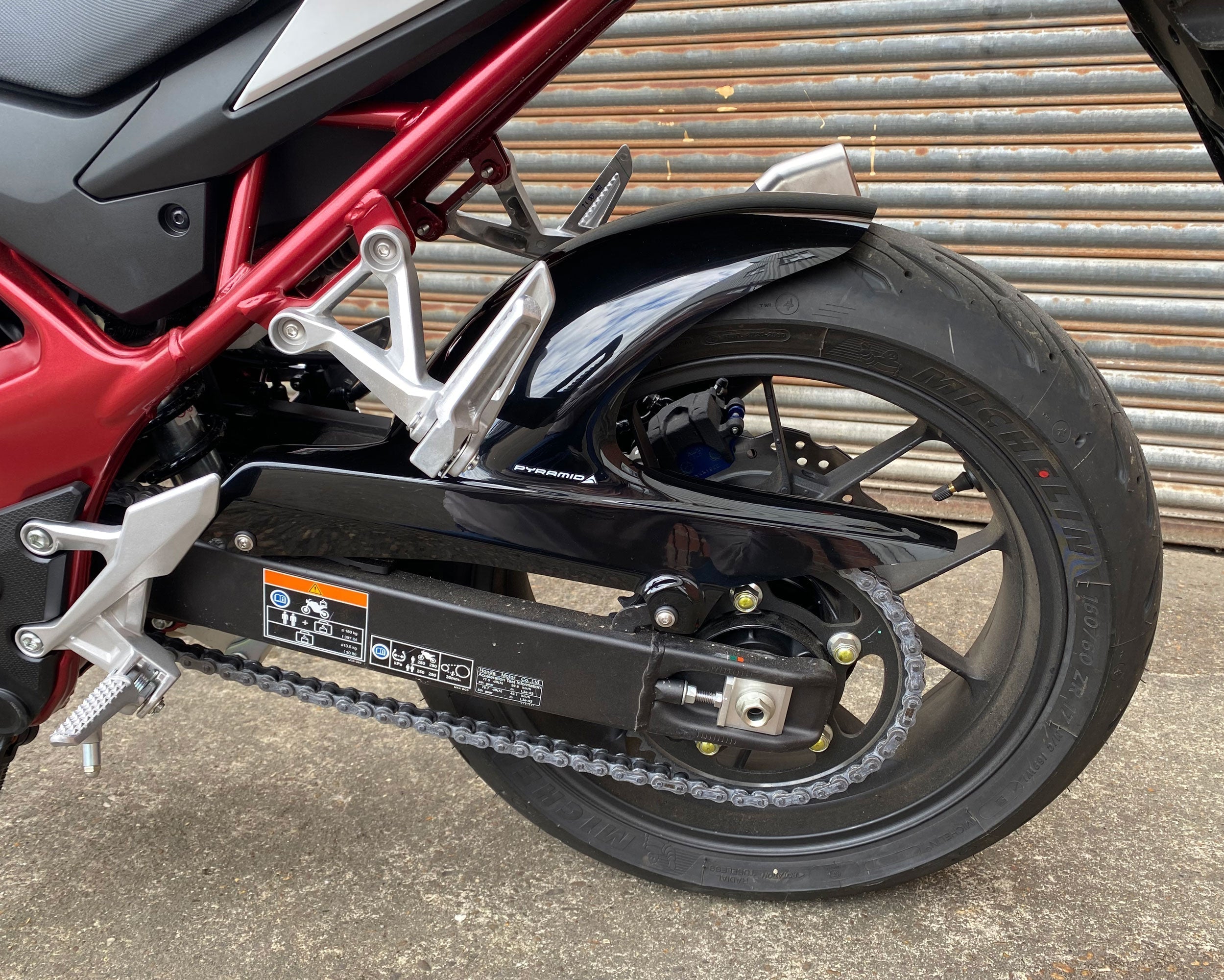 Pyramid Hugger | Gloss Black | Honda CB750 Hornet 2023>2025 - Shop name