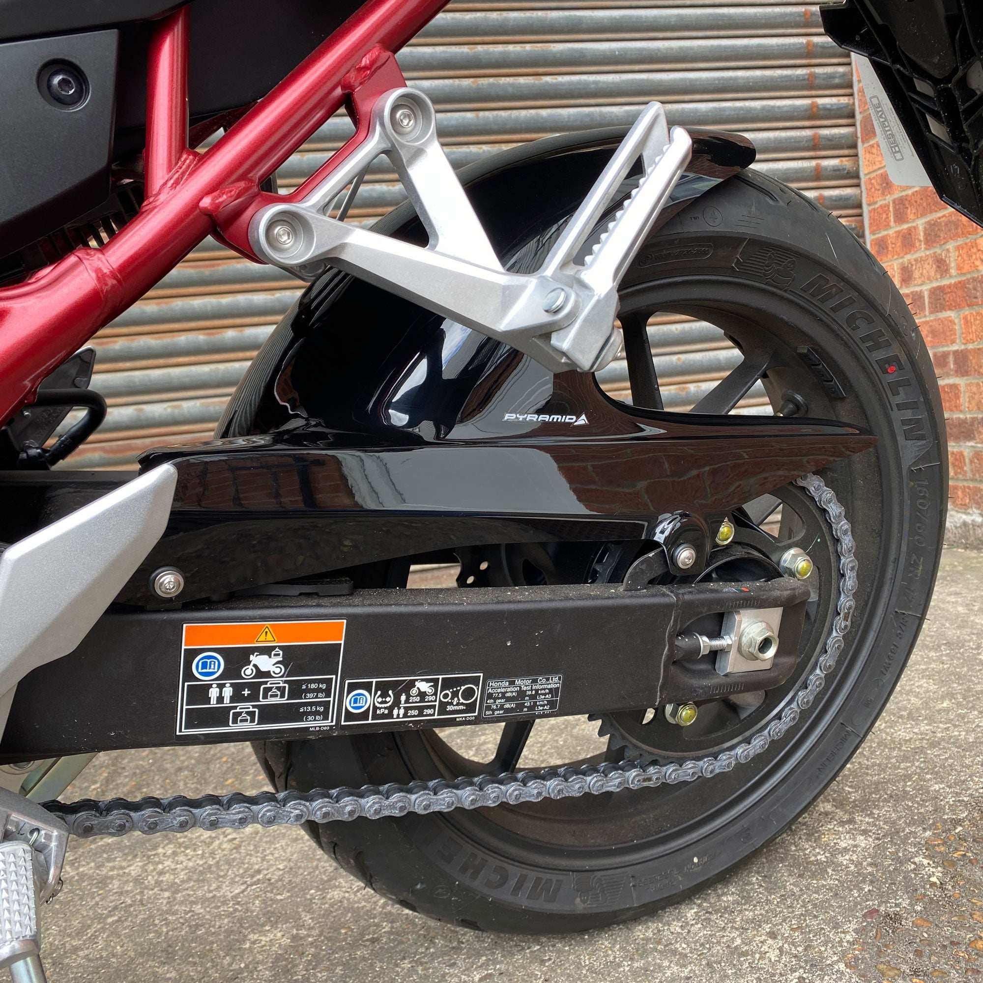 Pyramid Hugger | Gloss Black | Honda CB750 Hornet 2023>2025 - Shop name