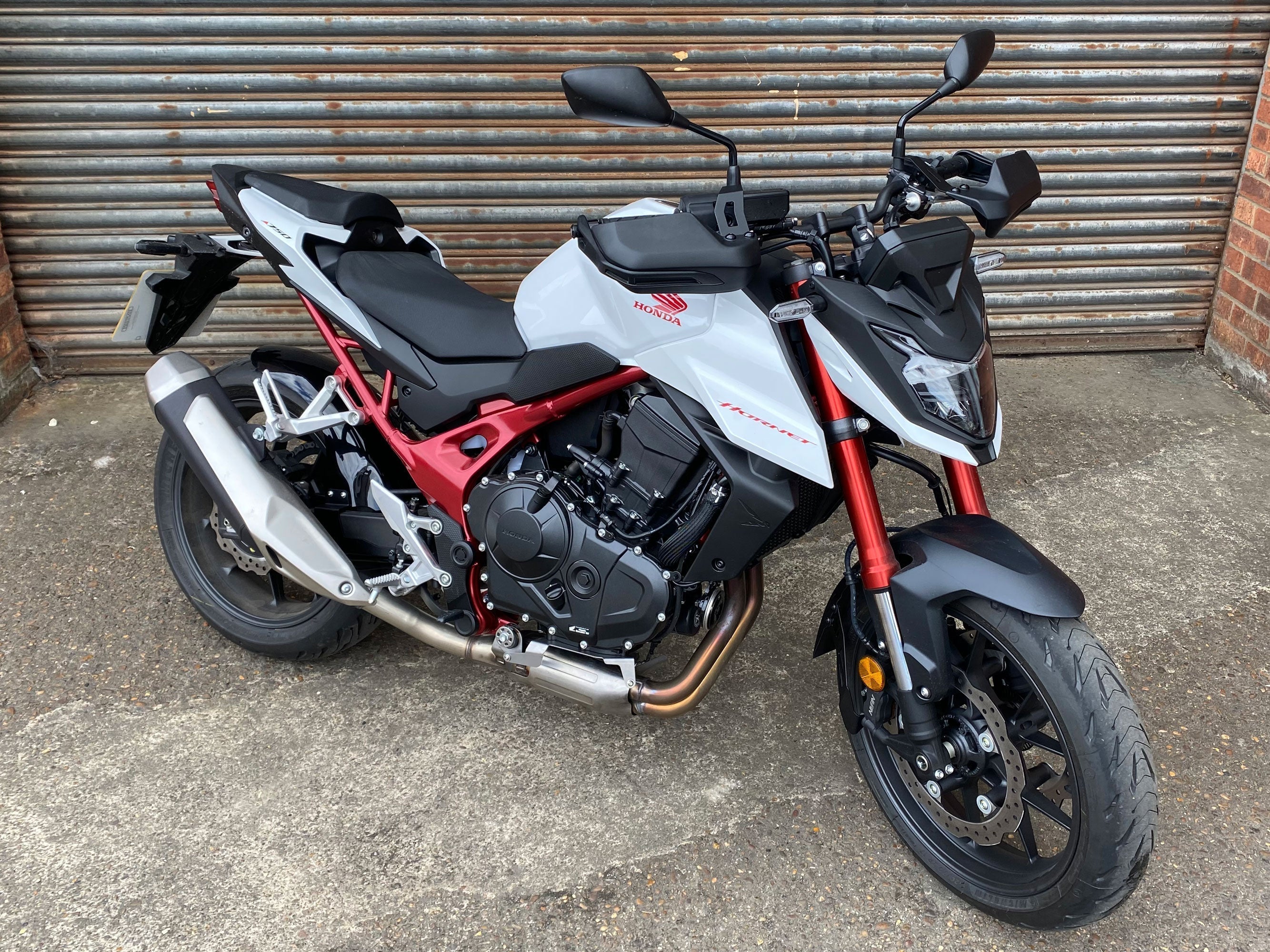Pyramid Hugger | Matte Black | Honda CB750 Hornet 2023>2025 - Shop name