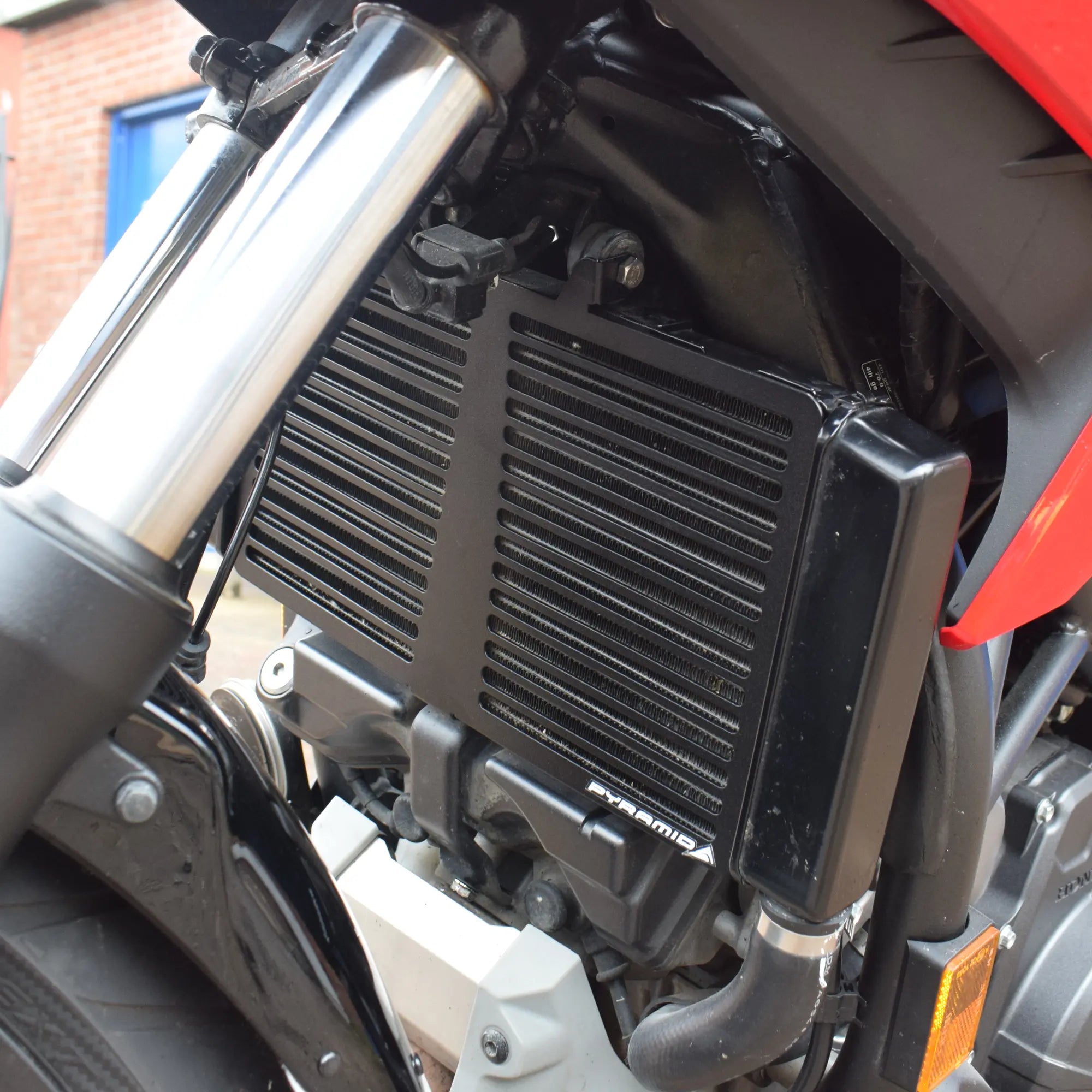 Pyramid Radiator Guard | Matte Black | Honda NC 700 S 2012>2014 - Shop name