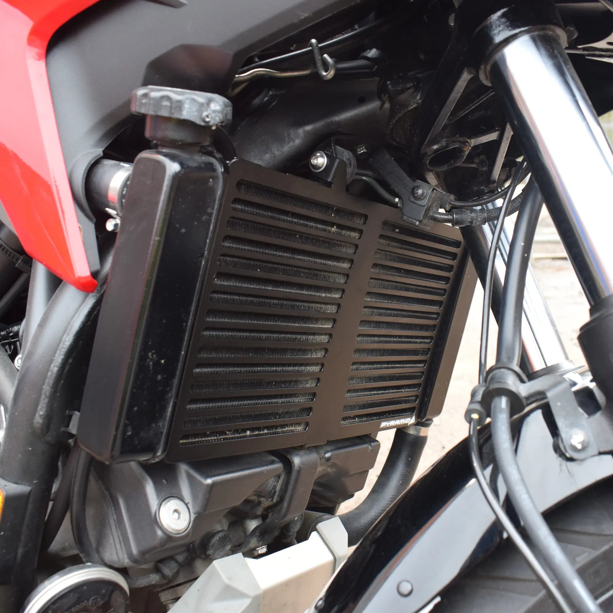 Pyramid Radiator Guard | Matte Black | Honda NC 700 X 2012>2014 - Shop name