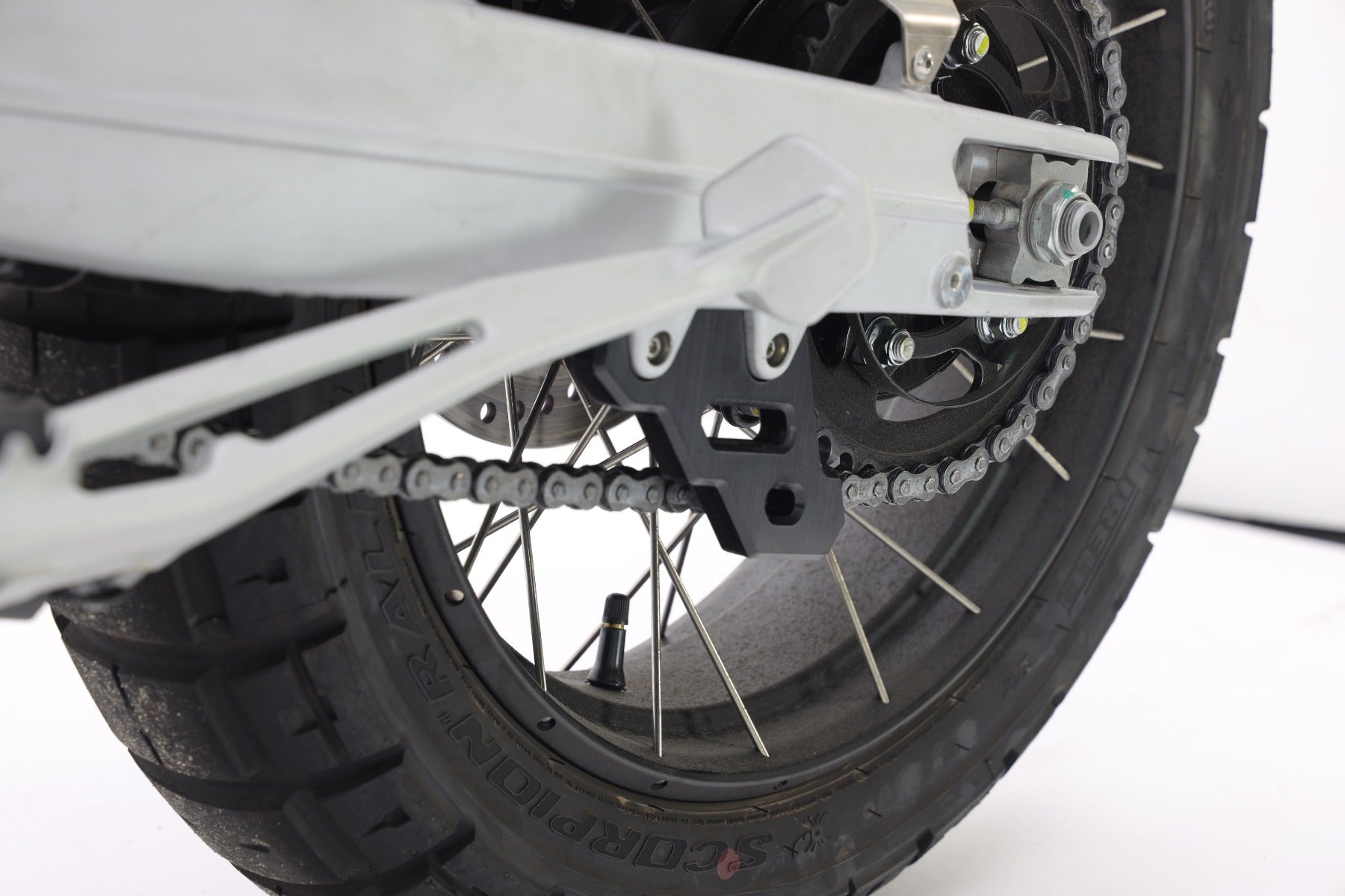 Isotta Final Chain Protection | Textured Black | Aprilia Tuareg 660 2022>2024 - Pyramid Motorcycle Accessories