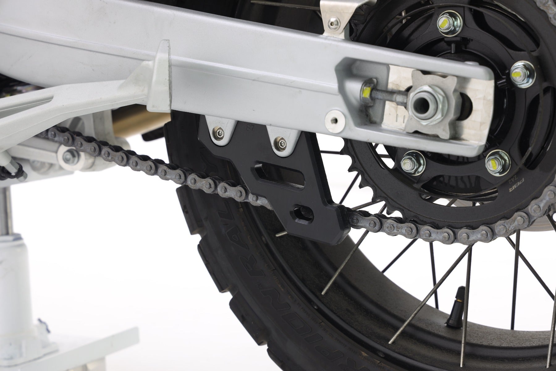 Isotta Final Chain Protection | Textured Black | Aprilia Tuareg 660 2022>2024 - Pyramid Motorcycle Accessories