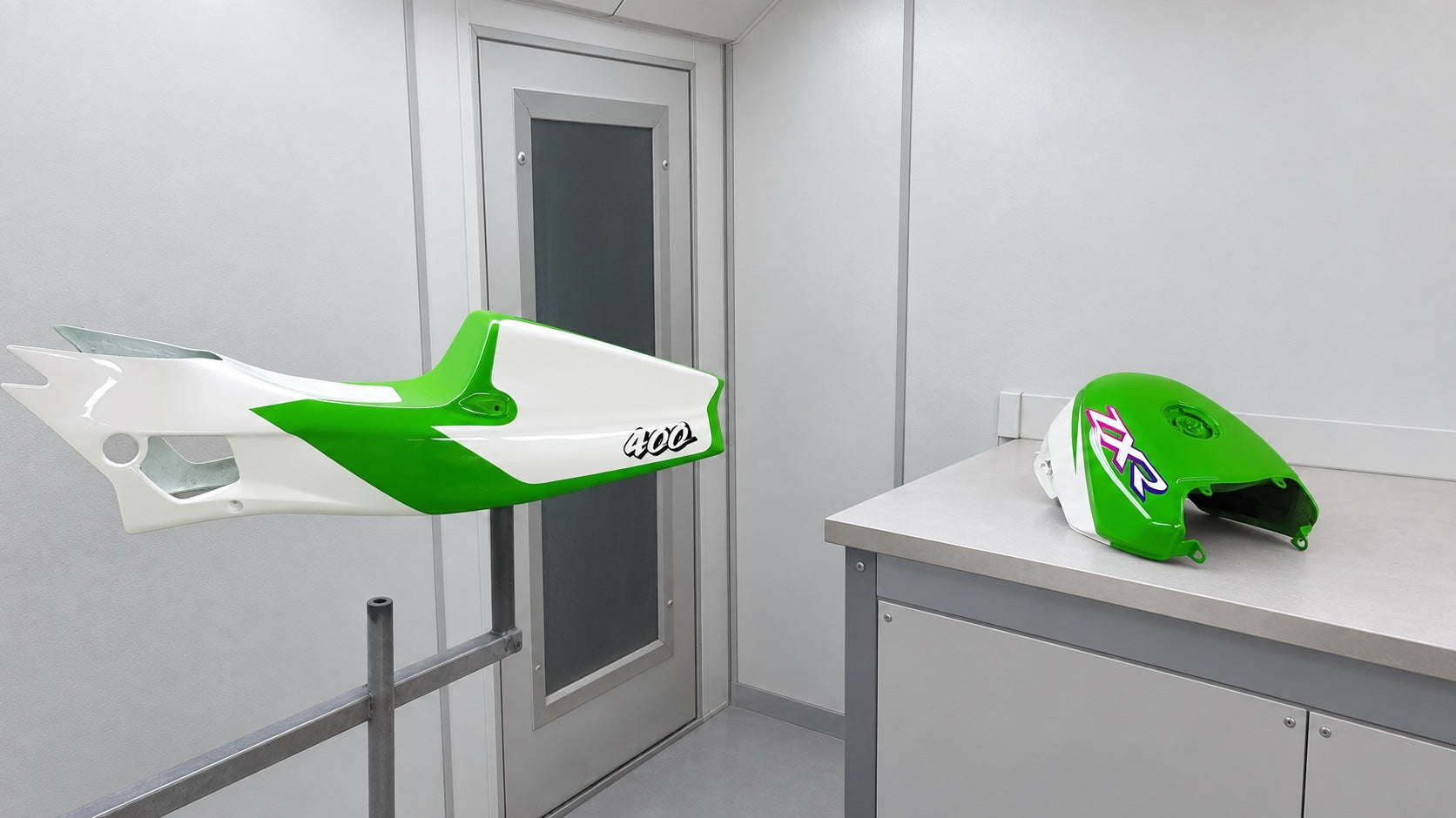 Green and white Kawasaki ZXR motorcycle bodywork prepared and painted by the team
