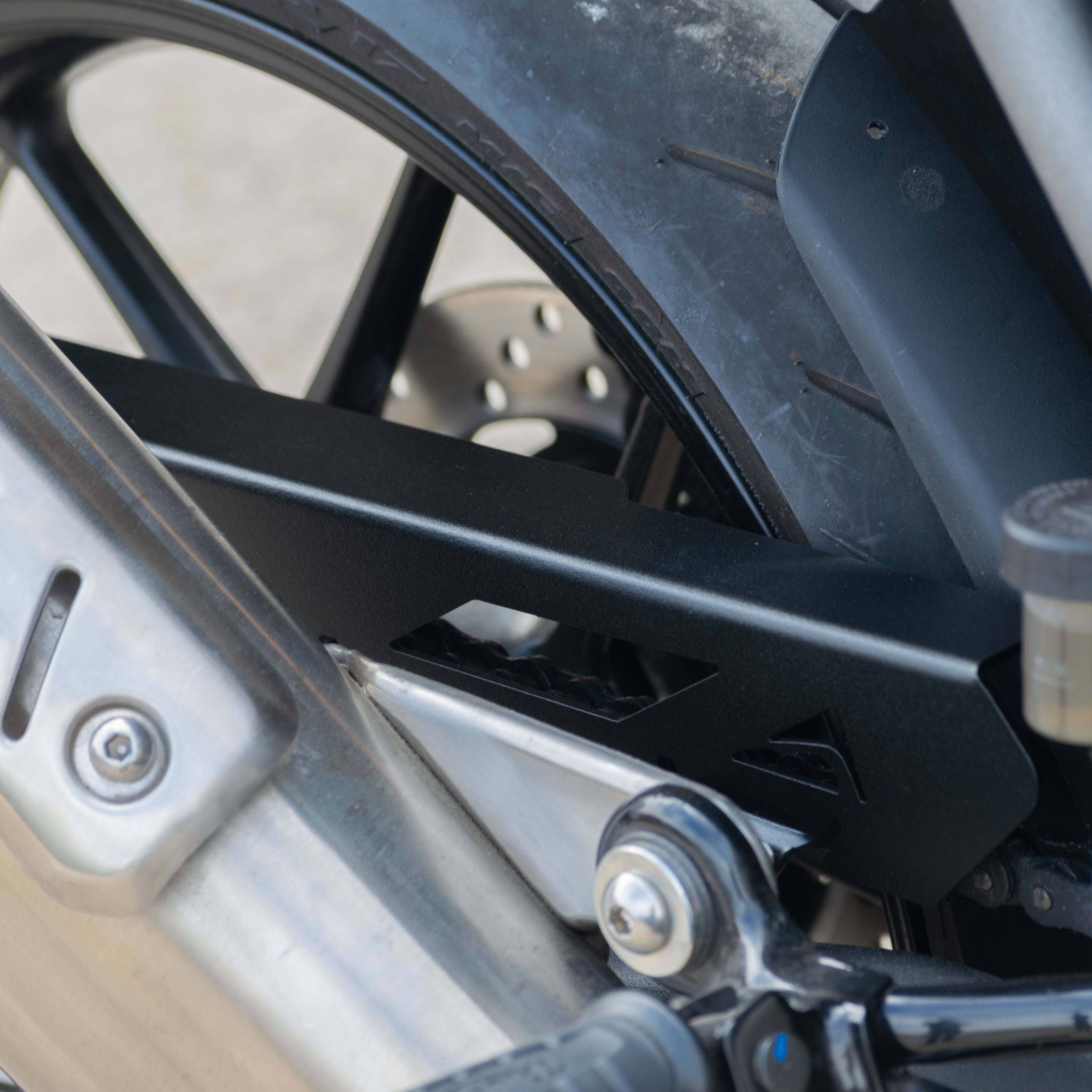 Pyramid Chainguard | Matte Black | Triumph Scrambler 400 X 2024>Current-Chain Guards-Pyramid Motorcycle Accessories