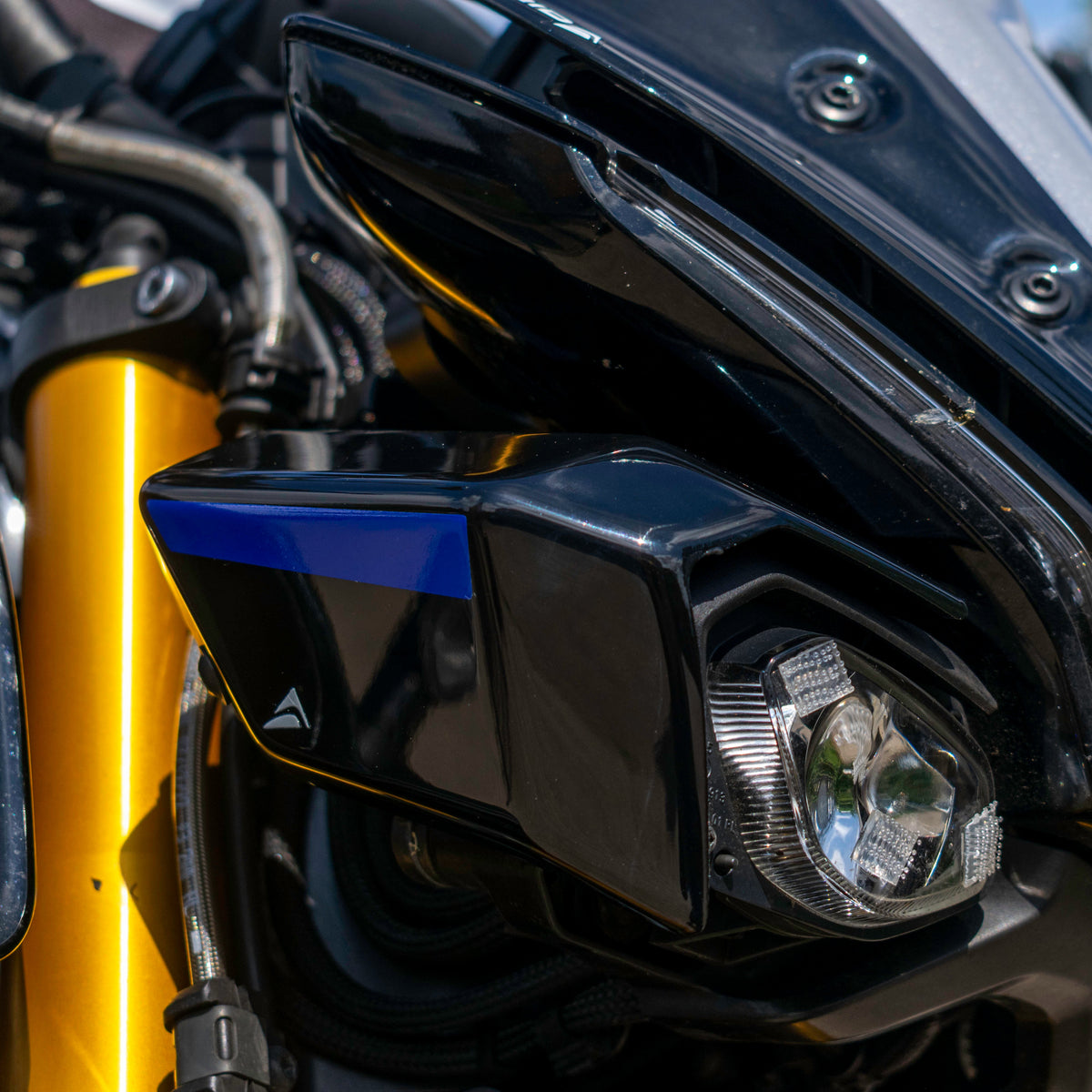 Yamaha MT-10 Gen 2 with Gen 1 style headlight shrouds fitted in Icon Blue