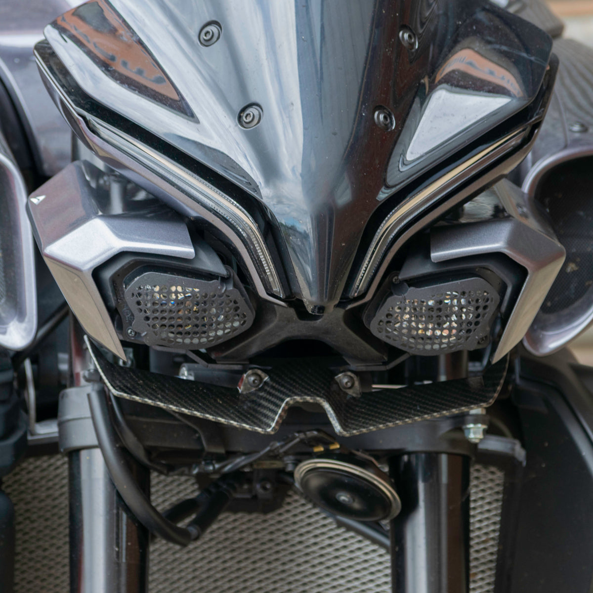 Yamaha MT-10 Gen 2 with Gen 1 style headlight shrouds fitted in Icon Blue