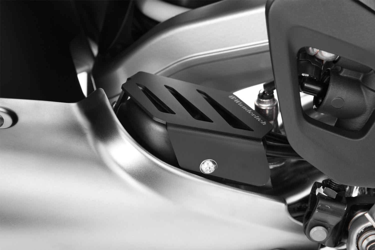 Wunderlich Exhaust Flap Cover | Black -   Pyramid Motorcycle Accessories