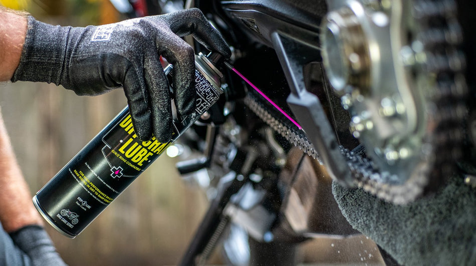 Muc-Off Motorcycle Dry Chain Lube applied to the chain and sprocket