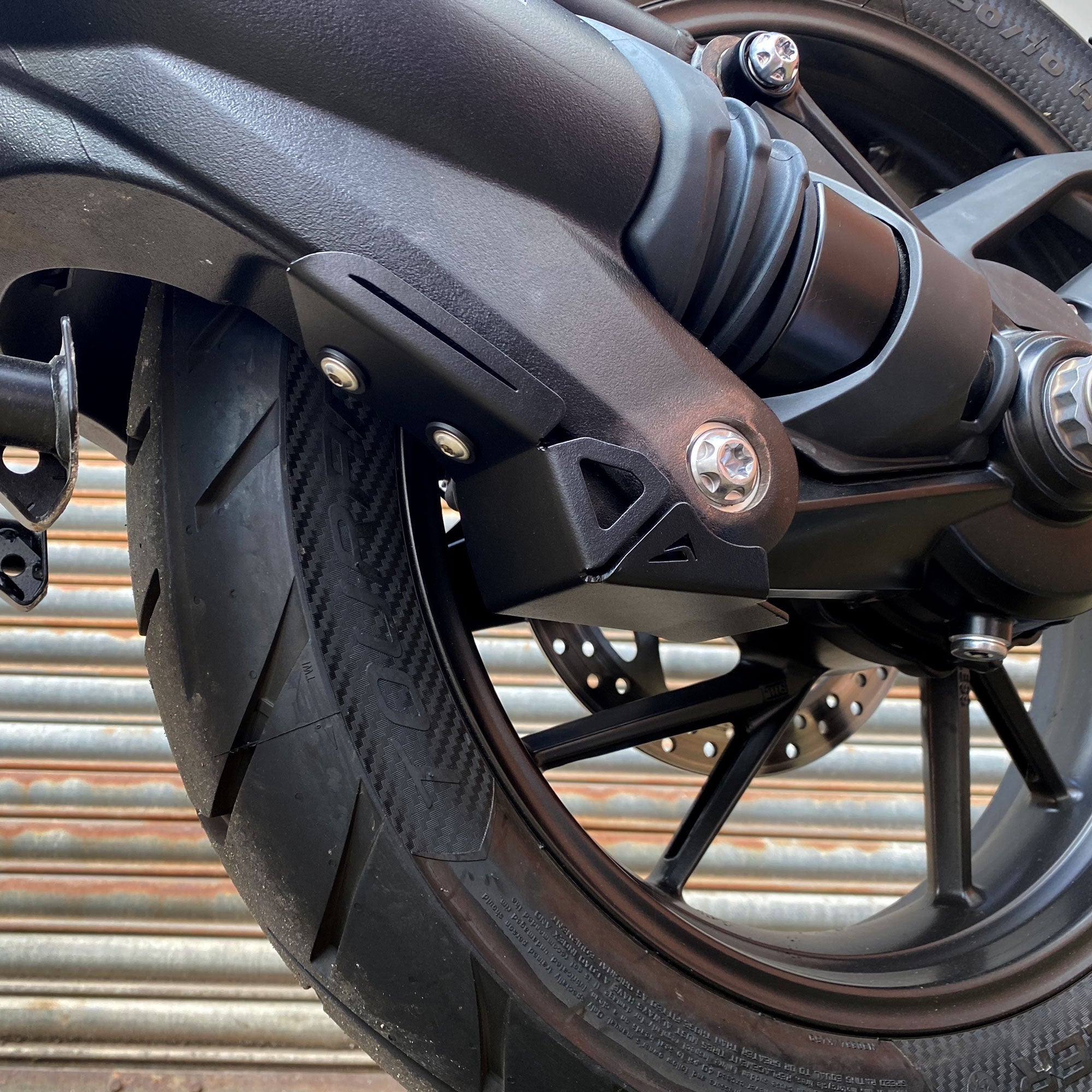 Pyramid Swingarm Protectors | Matte Black | Triumph Tiger 1200 GT 2022>Current -  Shop name